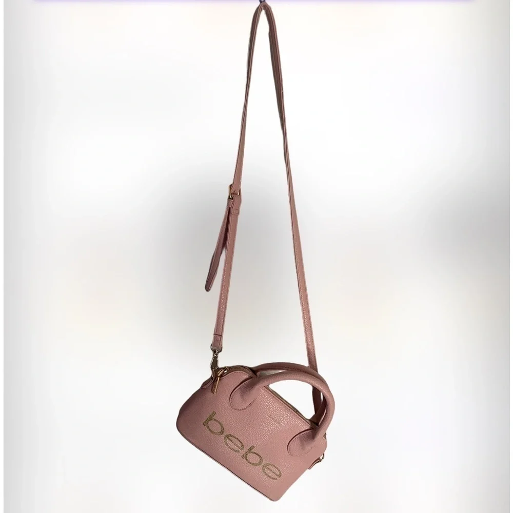 BEBE dusty pink satchel stamped crossbody bag